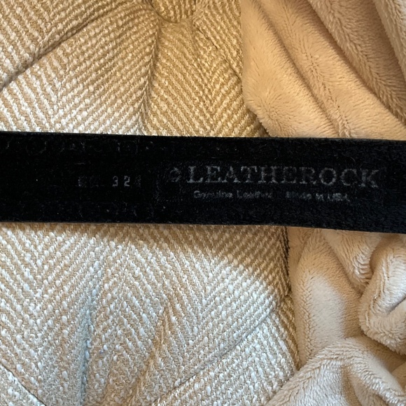 Leather belt. Black leather w/silver studs. Size 32. Silver cross buckle
